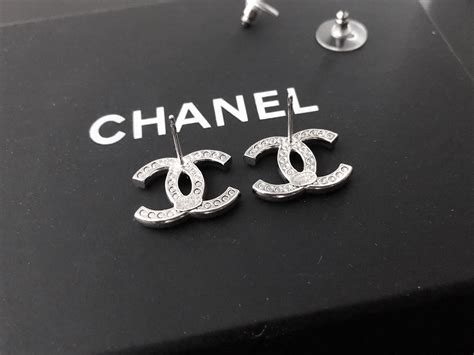 chanel metal logo earrings|genuine Chanel earrings.